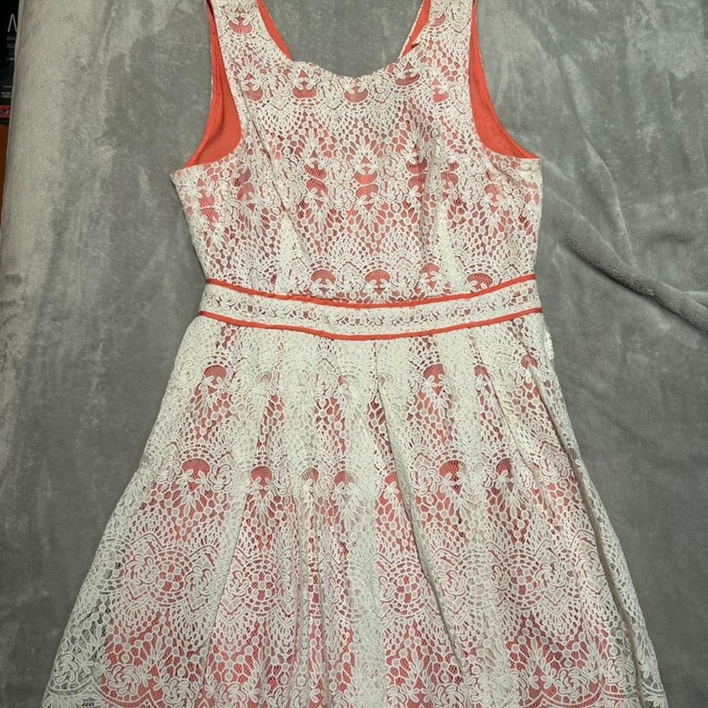 Elegant Lace Dress with Coral Accents